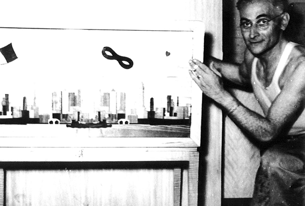 Adolpho Baldizzi with a cabinet he made. (Tenement Museum)