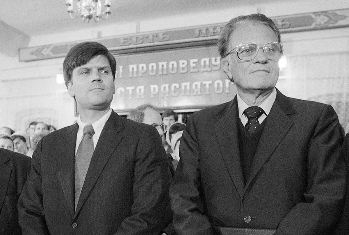American evangelist Billy Graham and his eldest son, Franklin, at the Novosibirsk Baptist Church in Siberia in September 1984. (AP/Boris Yurchenko)