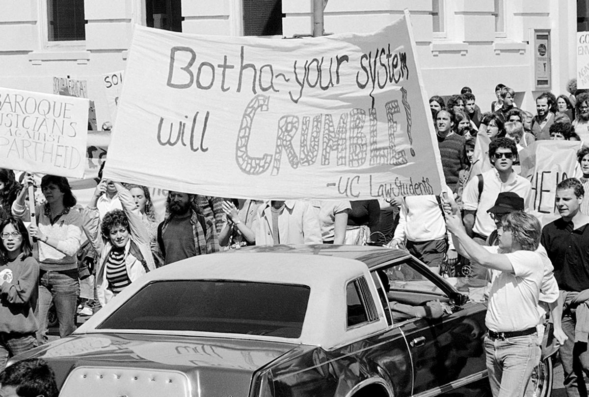 Anti-apartheid demonstrators march on the University of California Berkeley campus, April 17, 1985.  (AP/Ron Tussy)