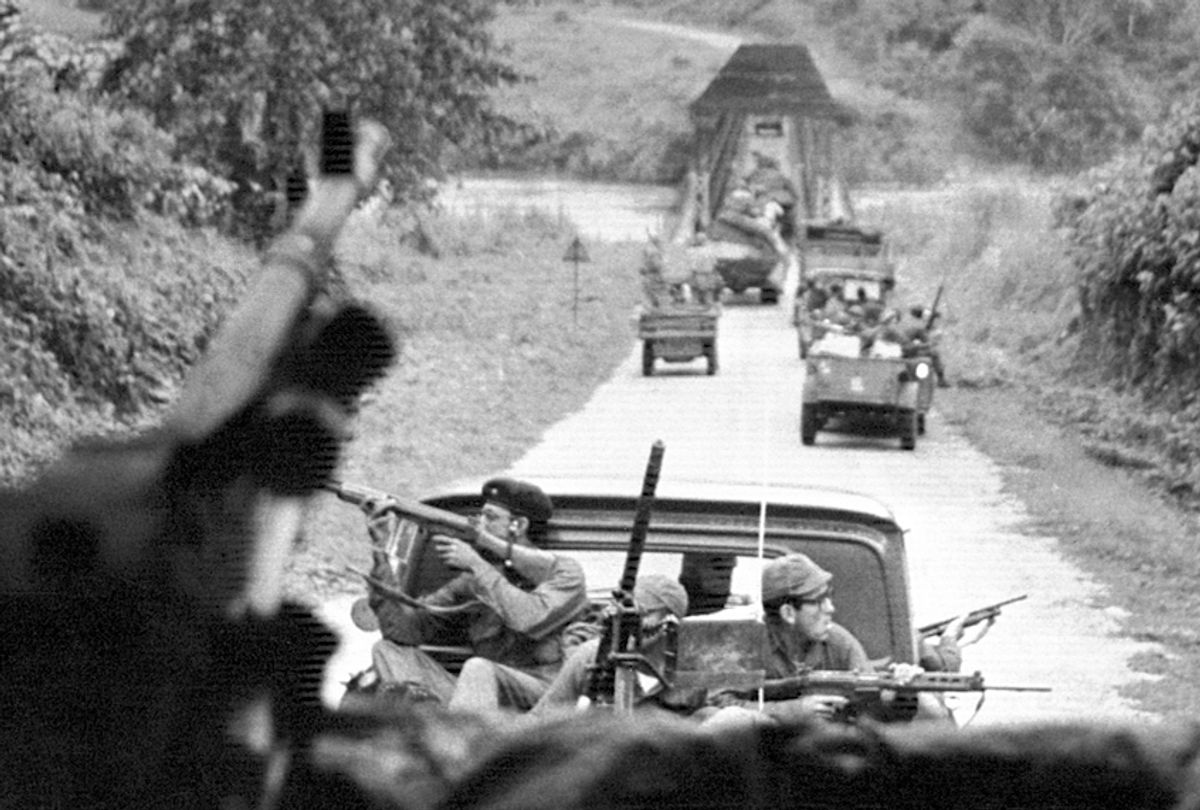 The Congolese army and mercenary column advancing towards Stanleyville, Nov. 28, 1964. (AP/Mannock)