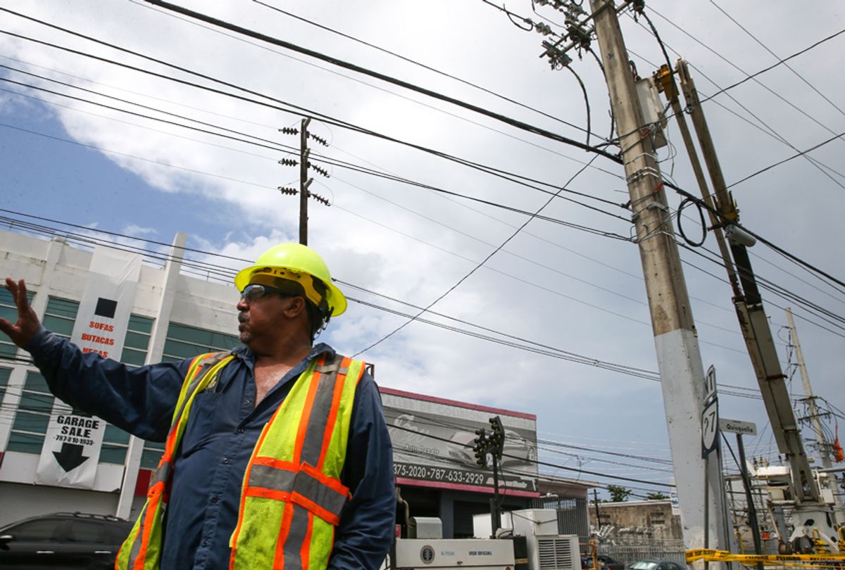Repair work is done on power lines affected by Hurricane Maria April 18, 2018 in San Juan, Puerto Rico. (Getty Images)