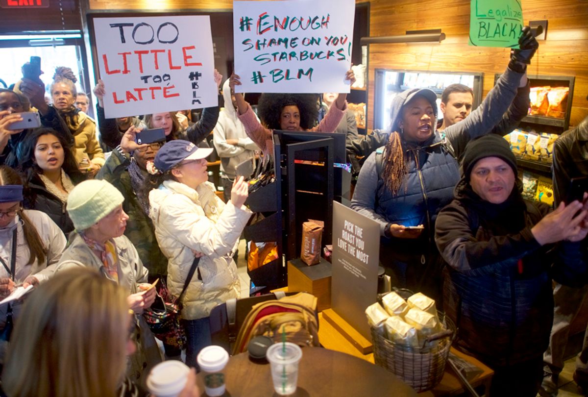 Demonstrators inside a Center City Starbucks on April 15, 2018 in Philadelphia, Pennsylvania. (Getty/Mark Makela)