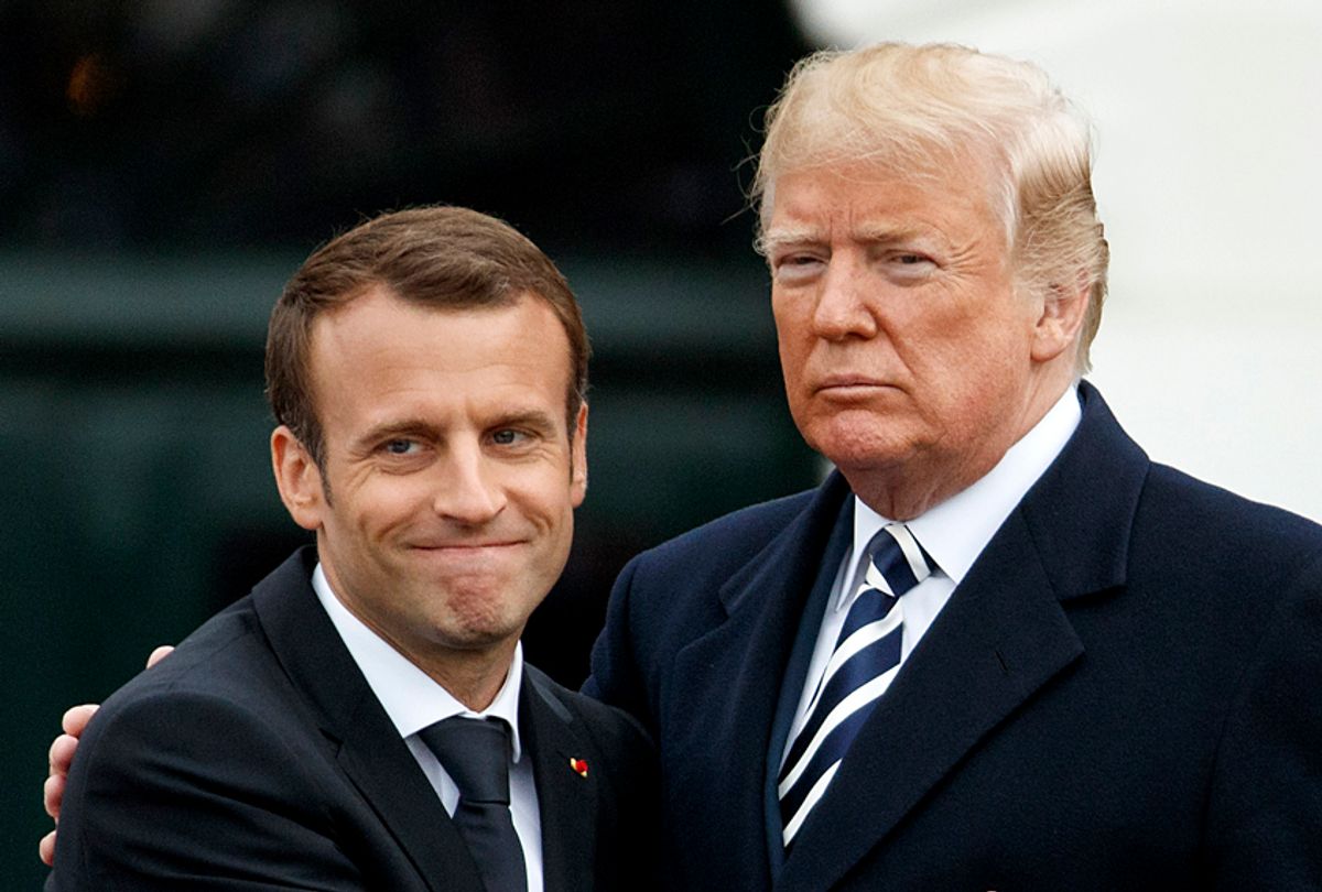 French President Emmanuel Macron hugs Donald Trump during a State Arrival Ceremony on the South Lawn of the White House, April 24, 2018. (AP/Evan Vucci)