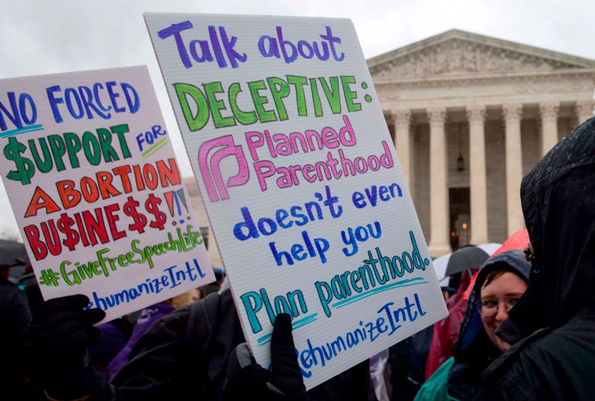 Anti-abortion activists demonstrate  in front of the US Supreme Court in Washington, DC. (Getty/Nicholas Kamm)