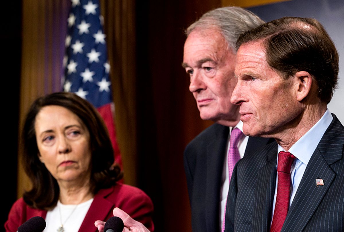 Sen. Richard Blumenthal, with Sen. Maria Cantwell and Sen. Ed Markey, speaks during a news conference on a petition to force a vote on net neutrality. (Getty/Zach Gibson)