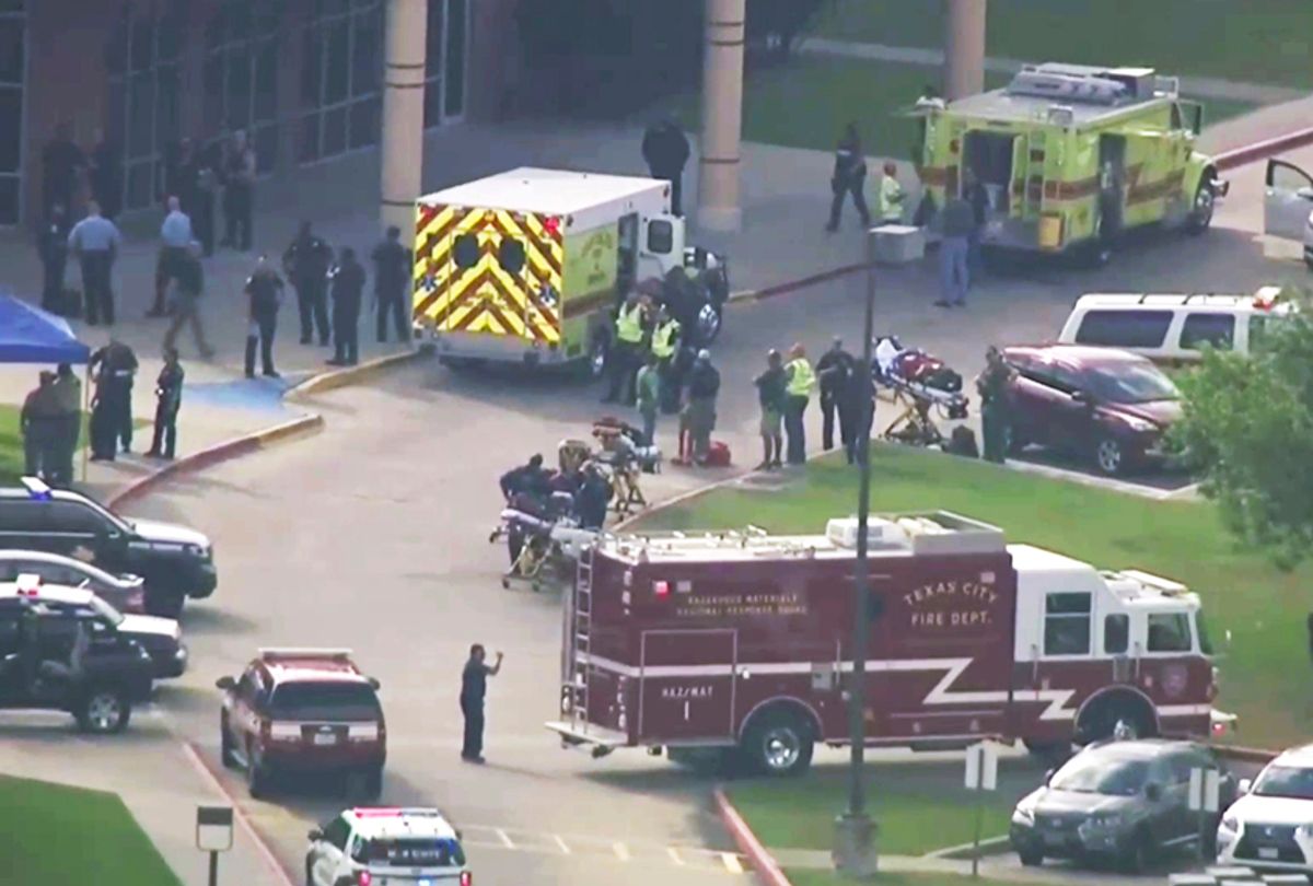 In this image taken from video emergency personnel and law enforcement officers respond to a high school near Houston after an active shooter was reported on campus, Friday, May 18, 2018, in Santa Fe, Texas.  (AP/KTRK-TV)