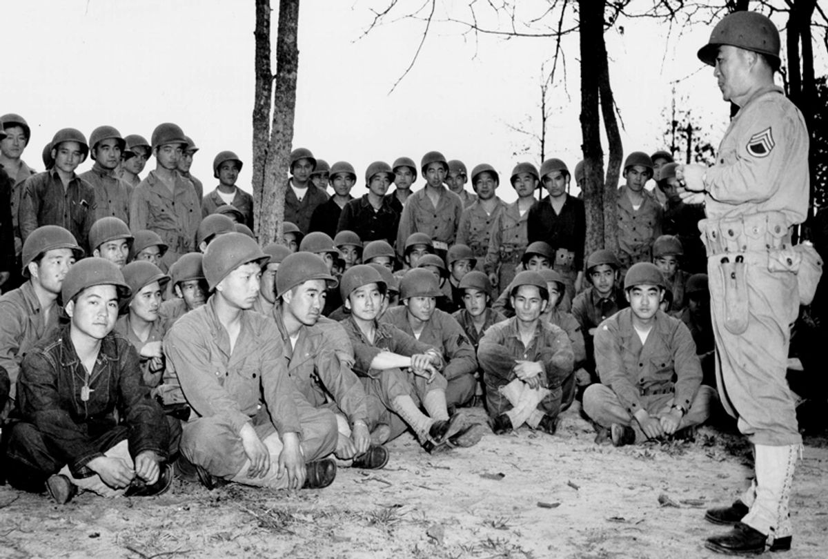 The 100th Infantry Battalion receiving grenade training in 1943. (United States Army Center of Military History)