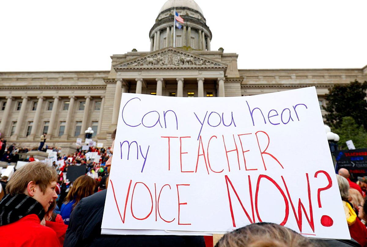 Public school teachers and their supporters protest against a pension reform bill at the Kentucky State Capitol. (Getty/Bill Pugliano)