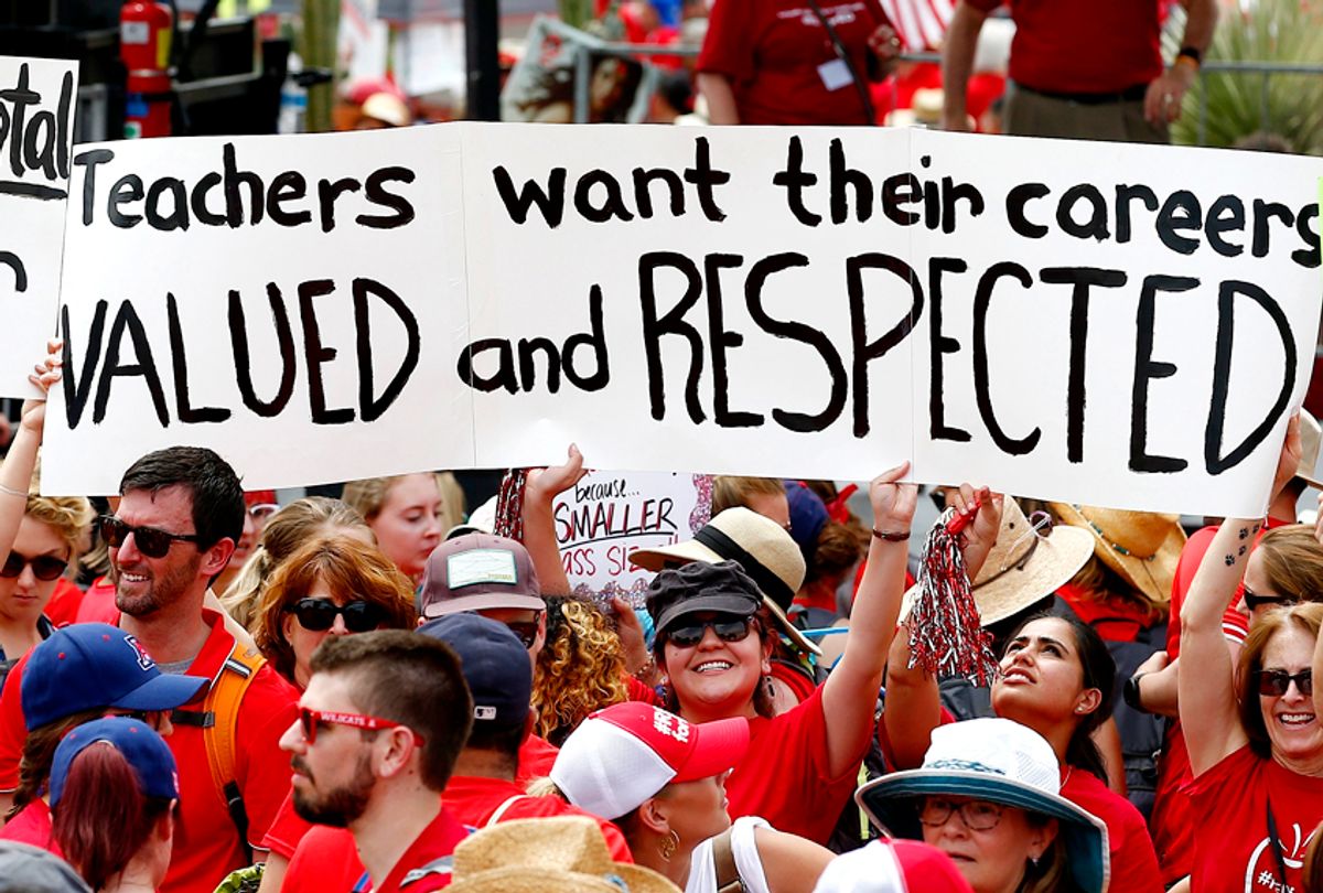 Thousands participate in a protest at the Arizona Capitol for higher teacher pay and school funding. (AP/Ross D. Franklin)