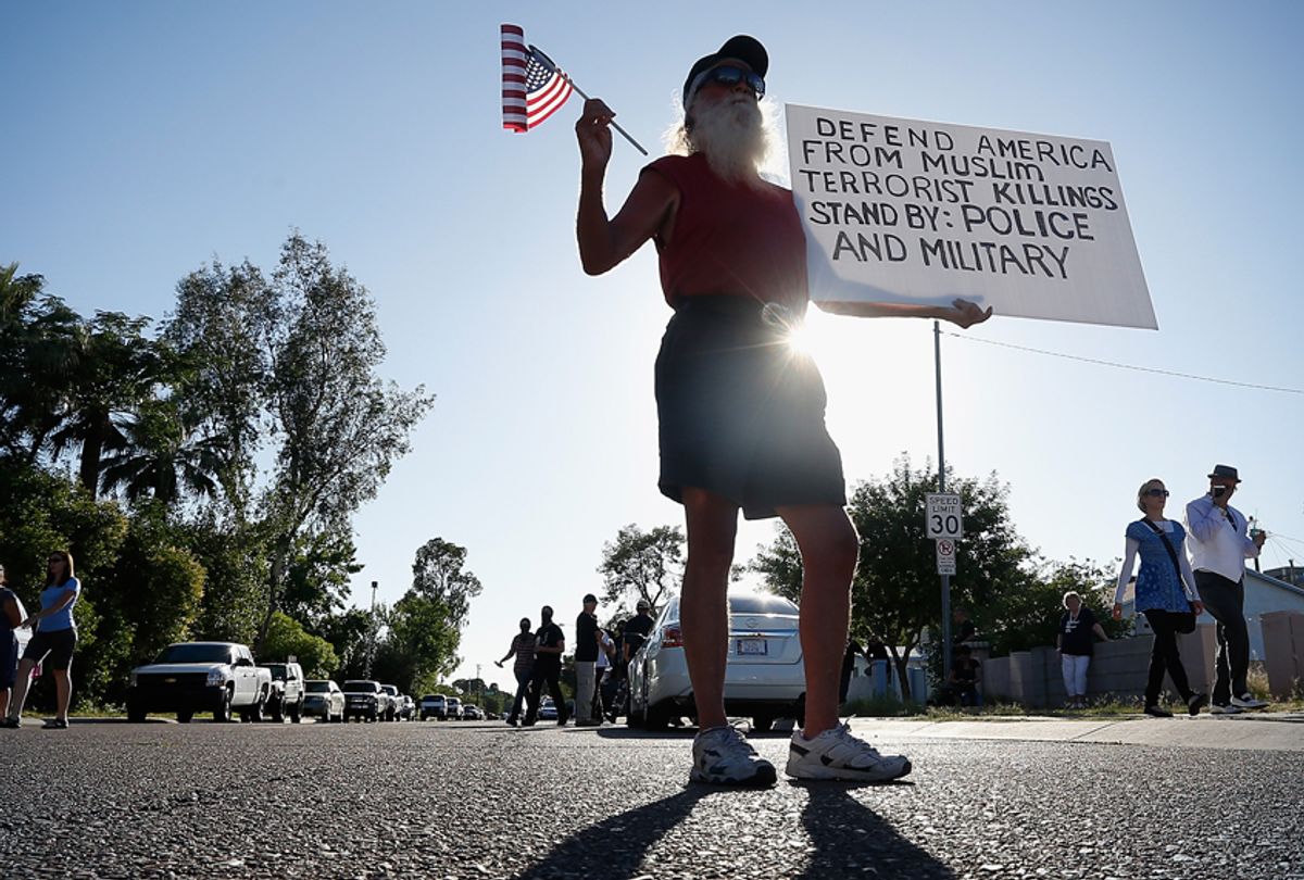 A protester outside the Islamic Community Center on May 29, 2015 in Phoenix, Arizona. (Getty/Christian Petersen)