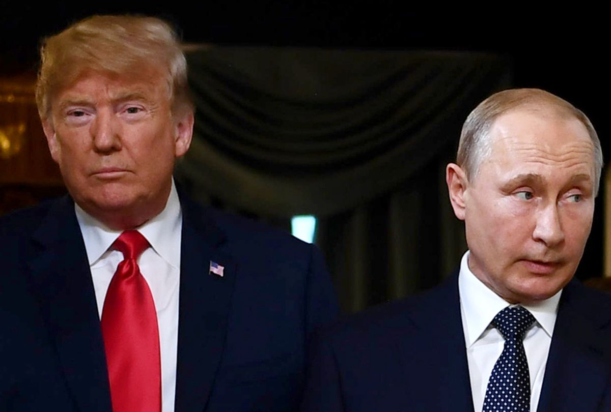 Donald Trump and Vladimir Putin arrive for a meeting in Helsinki, on July 16, 2018.  (Getty/Brendan Smialowski)