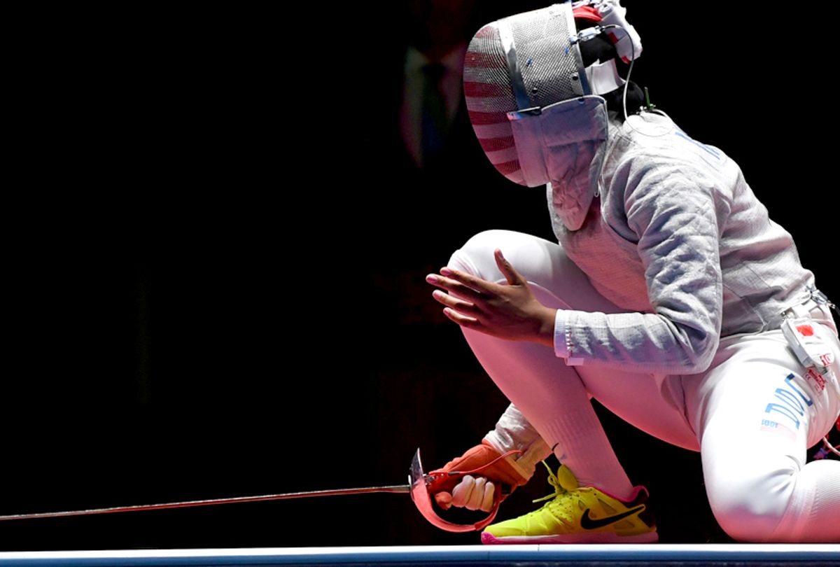 Ibtihaj Muhammad reacts during the womens team sabre bronze medal bout part of the fencing event of the Rio 2016 Olympic Games/ (Getty/Kirill Kudryavtsev)