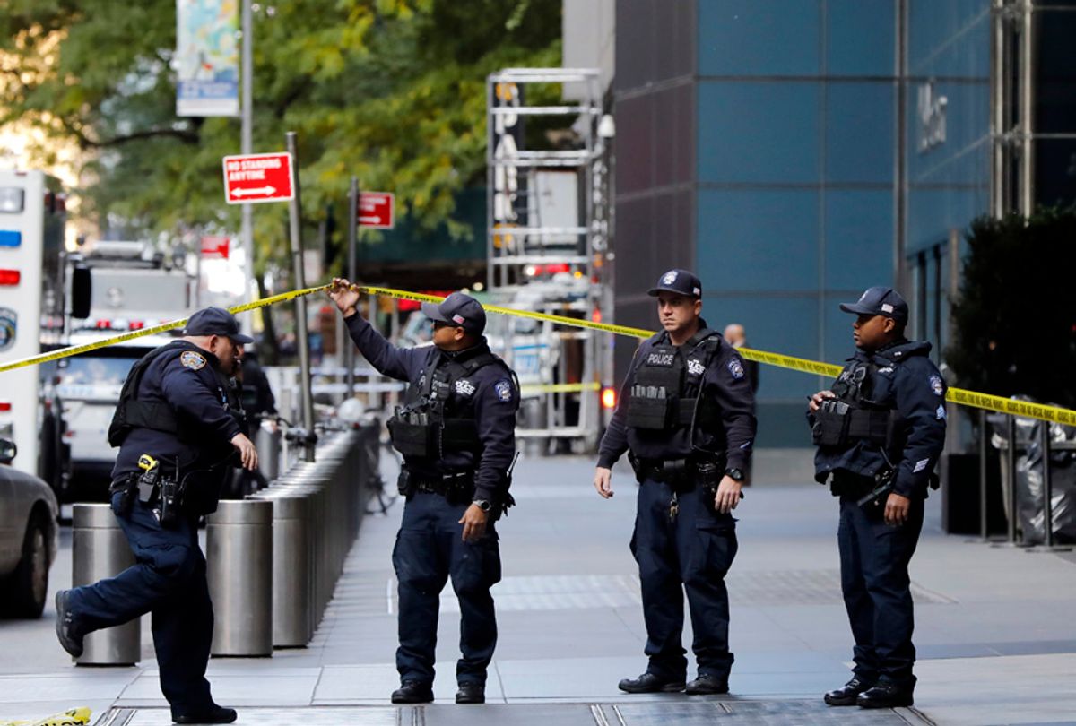 New York City Police Dept. officers arrive outside the Time Warner Center, in New York, Wednesday, Oct. 24, 2018. A police bomb squad was sent to CNN's offices in New York City and the newsroom was evacuated because of a suspicious package. (AP/Richard Drew)