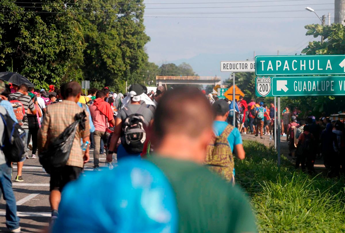 Central American migrants walk north toward Tapachula, after departing Ciudad Hidalgo, Mexico, Sunday, Oct. 21, 2018.  (AP/Moises Castillo)