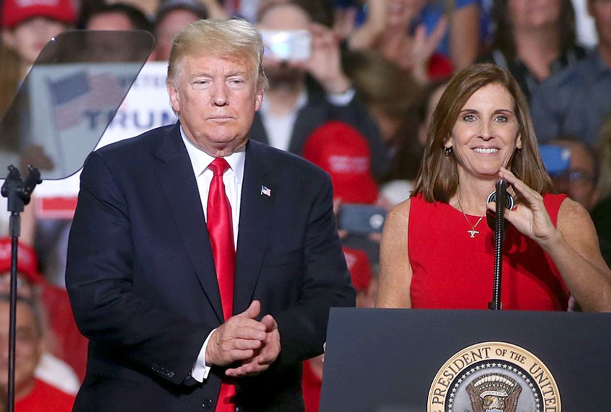 Donald Trump and Martha McSally during a rally at the International Air Response facility on October 19, 2018 in Mesa, Arizona. (Getty/Ralph Freso)