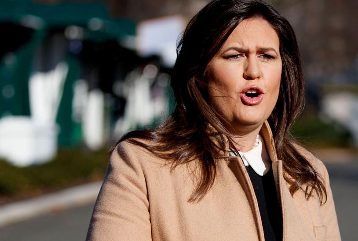 White House press secretary Sarah Huckabee Sanders talks with reporters outside the White House, Tuesday, Dec. 18, 2018. (AP/Evan Vucci)