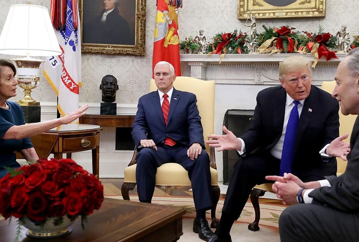 Donald Trump talks about border security with Senate Minority Leader Chuck Schumer and House Minority Leader Nancy Pelosi as Vice President Mike Pence sits nearby in the Oval Office on December 11, 2018 in Washington, DC. (Getty/Mark Wilson)