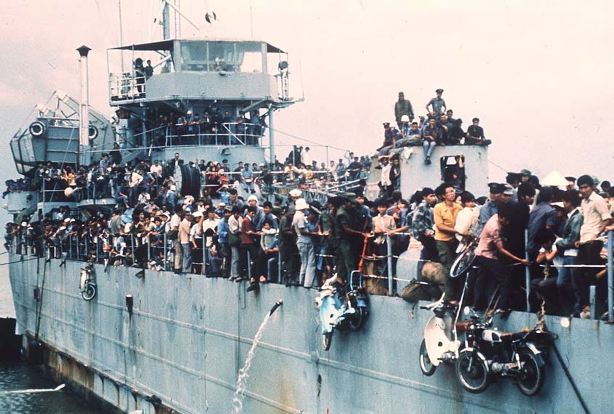 Jampacked with more than 7,000 refugees, the South Vietnamese Navy ship HQ-504 arrives at Vung Tau port, the South Vietnam' s most popular sea resort, and now the only port city in the Government hands. More than 20,000 Vietnamese refugees including those from Hue and Da Nang arrived at Vung Tau from Cam Ranh Bay, on board the Navy ships. (Getty/StaffAFP)