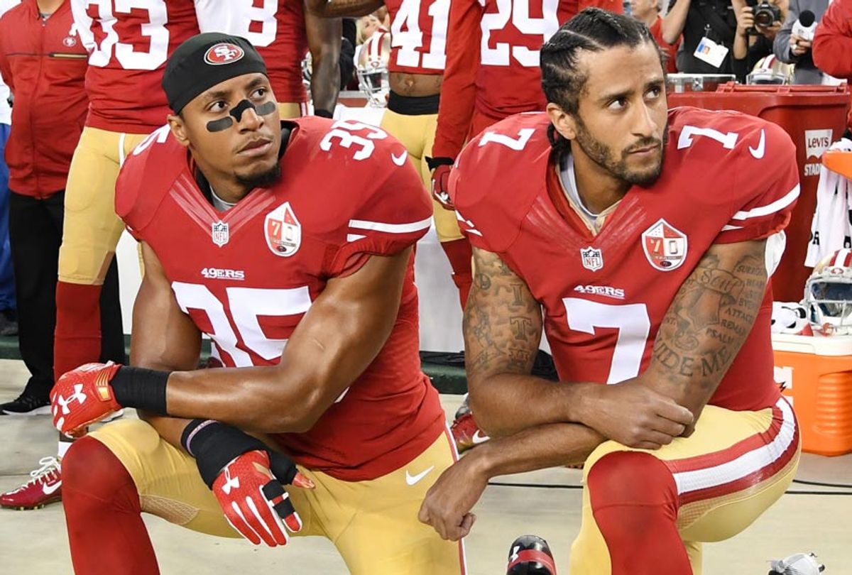 Eric Reid and Colin Kaepernick of the San Francisco 49ers kneel in protest during the national anthem. (Getty/Thearon W. Henderson)
