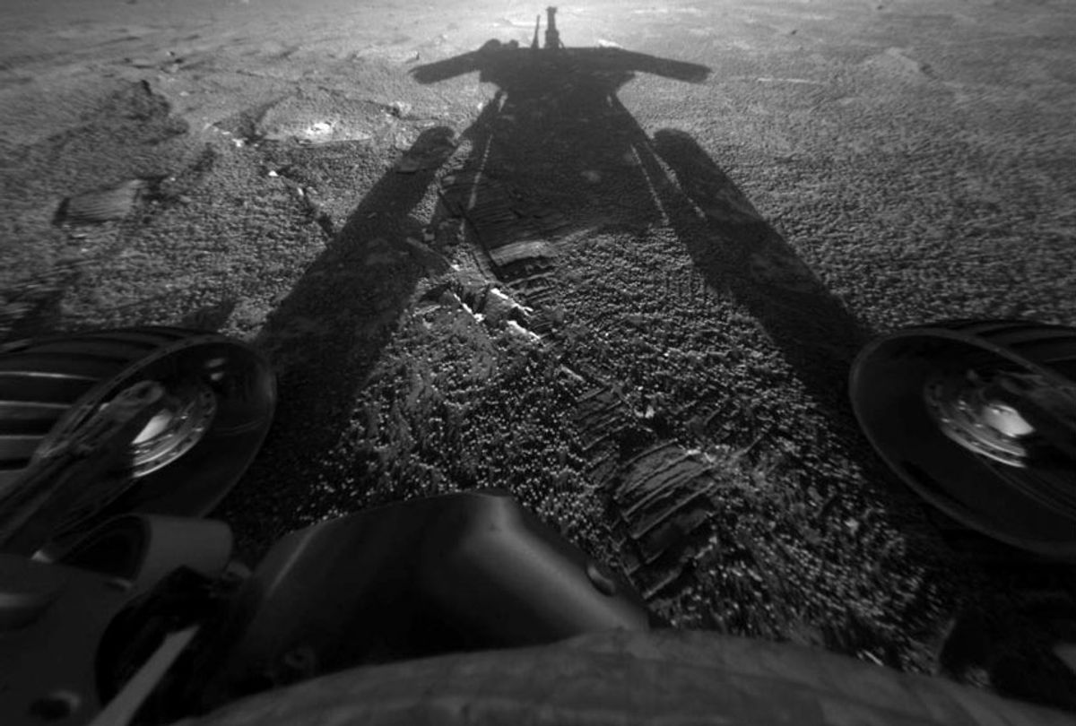 The shadow of the Mars Exploration Rover Opportunity as it traveled farther into Endurance Crater in the Meridiani Planum region of Mars (NASA/JPL-Caltech via AP)