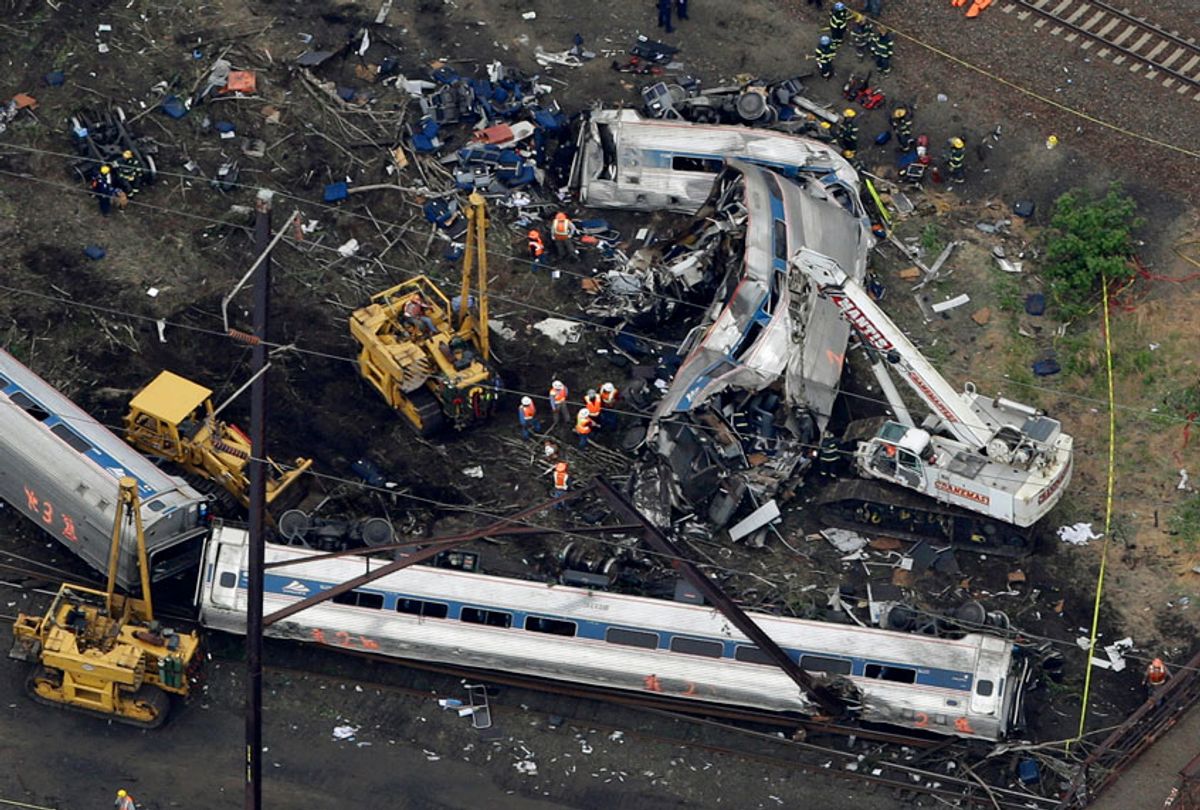 emergency personnel work at the scene of a deadly train derailment in Philadelphia, May 13, 2015. (AP/Patrick Semansky)