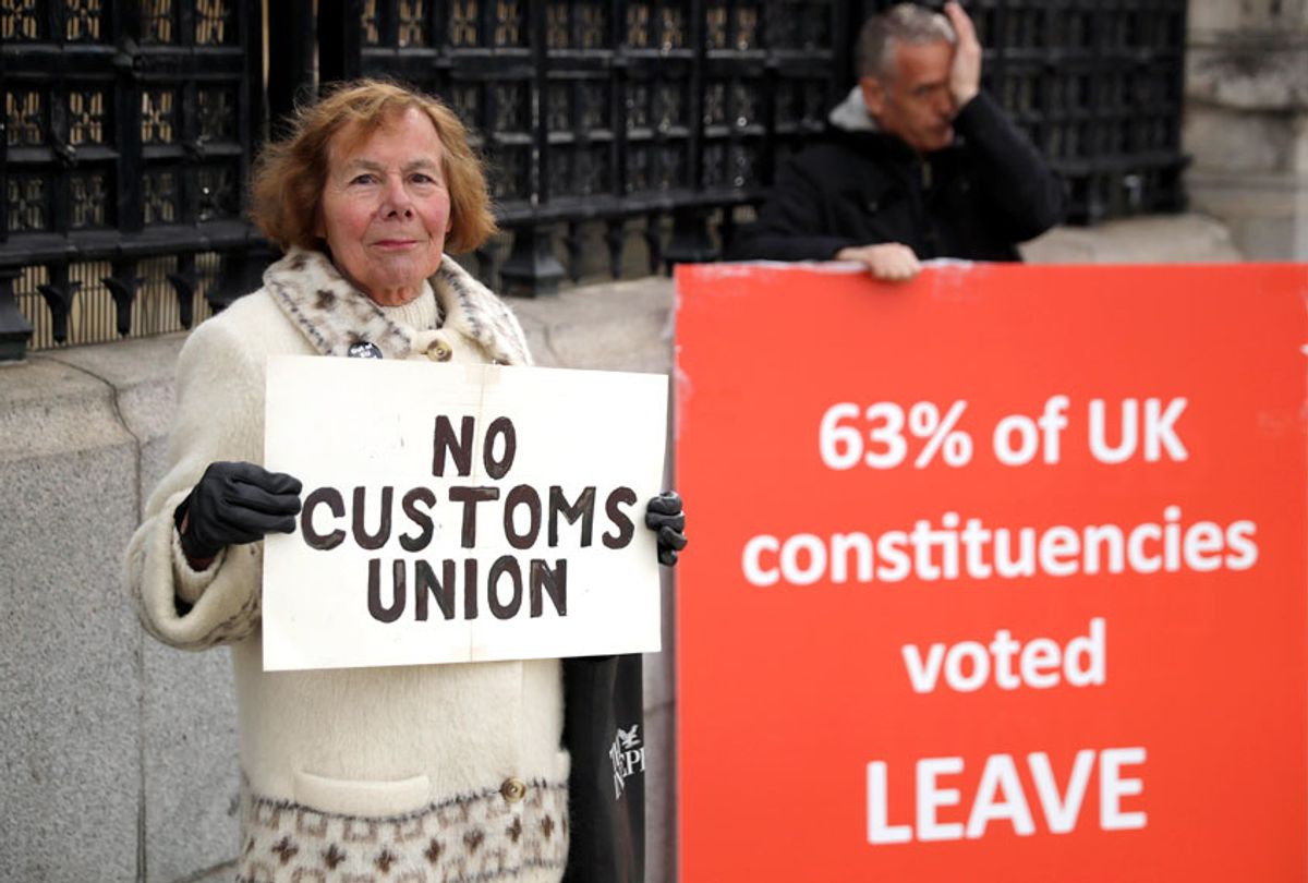 Pro-Brexit supporters protest outside the Houses of Parliament in London, Monday, March 18, 2019.  (AP/Matt Dunham)