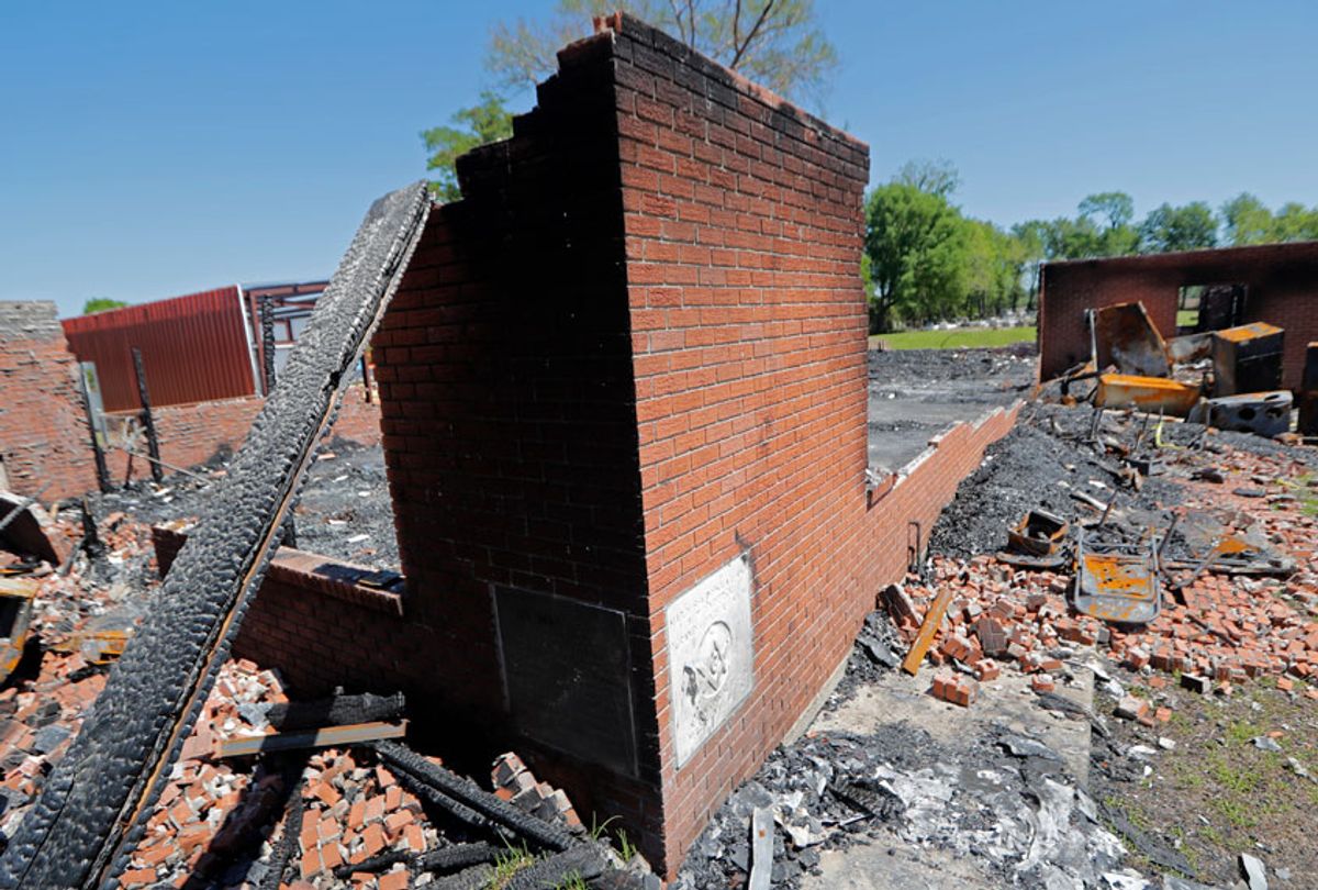 The burnt ruins of the St. Mary Baptist Church, one of three that recently burned down in St. Landry Parish, are seen in Port Barre, La., Wednesday, April 10, 2019.  (AP/Gerald Herbert)