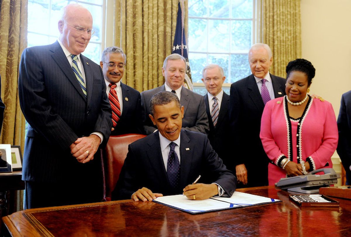 Obama signs the Fair Sentencing Act in the Oval Office of the White House, in Washington DC, USA, 03 August 2010.  (Michael Reynolds-Pool/Getty Images)
