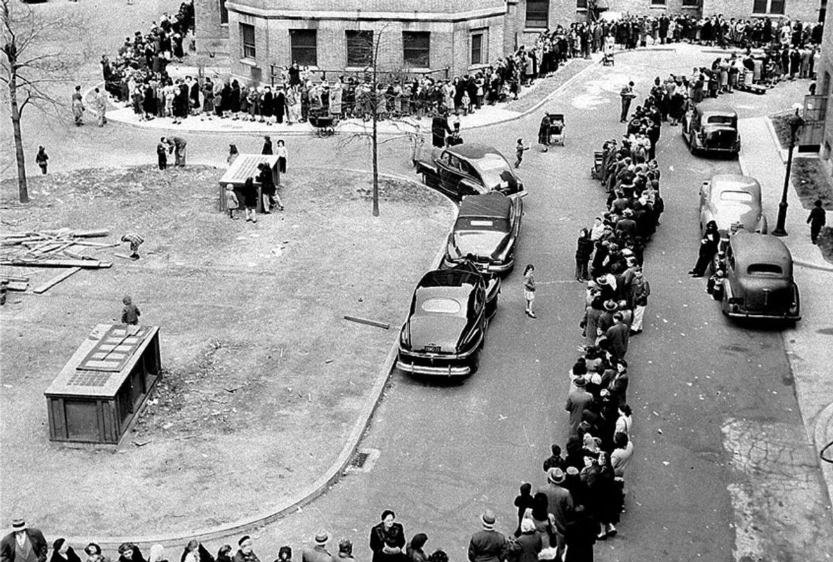 In this April 14, 1947 file photo, a long line winds toward the entrance to Morrisania Hospital in the Bronx borough of New York, where doctors are inoculating against smallpox. In an attempt to halt the spread of the disease, officials said city residents were being vaccinated at the rate of eight a minute. (AP Photo)