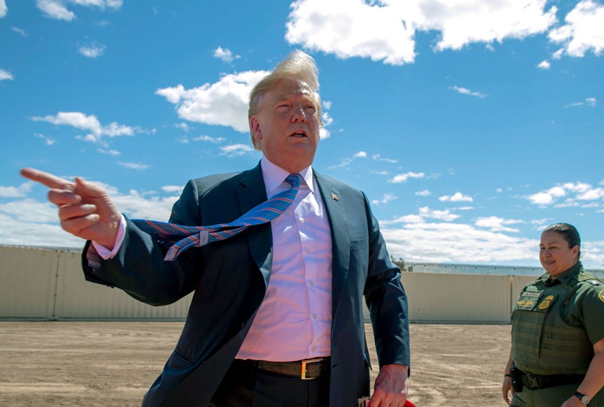 President Donald Trump speaks as he visits a new section of the border wall with Mexico in Calexico, CA. (Getty/Jacquelyn Martin)