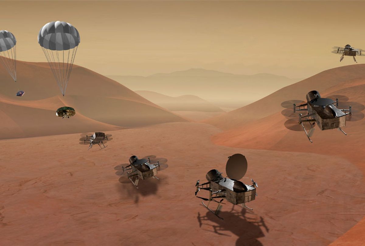 This artist's rendering made available by NASA shows multiple views of the Dragonfly dual-quadcopter lander that would take advantage of the atmosphere on Saturn's moon Titan to explore multiple locations, some hundreds of miles apart.  (NASA via AP)