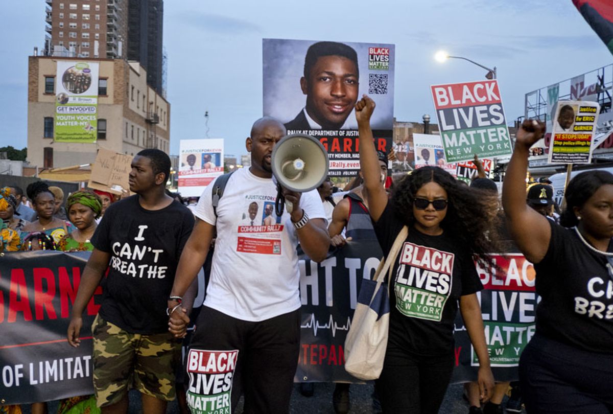 Activists with Black Lives Matter protest in the Harlem neighborhood of New York, Tuesday, July 16, 2019, in the wake of a decision by federal prosecutors who declined to bring civil rights charges against New York City police Officer Daniel Pantaleo, in the 2014 chokehold death of Eric Garner. (AP/Craig Ruttle)