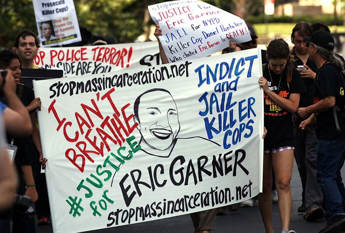 People protest in Staten Island on the one year anniversary of the death of Eric Garner on July 17, 2015 in New York City.  (Getty/Spencer Platt)