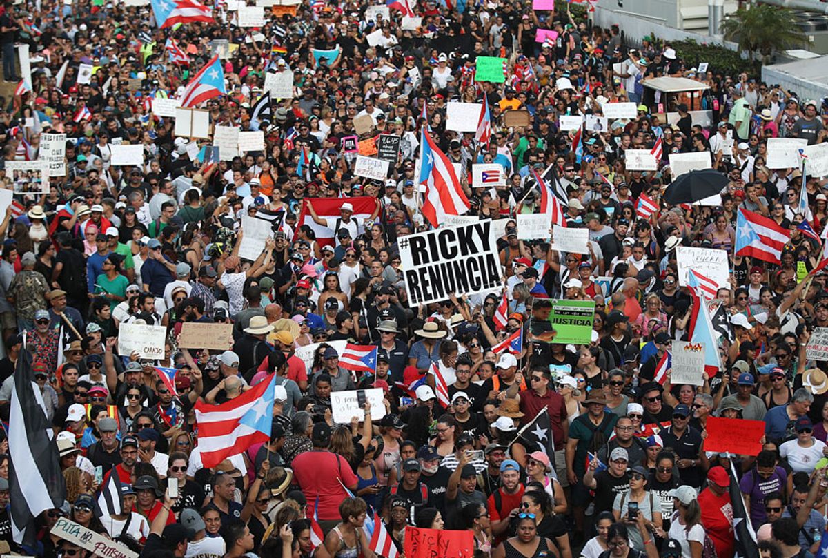Demonstrators protest against Ricardo Rossello, the Governor of Puerto Rico on July 17, 2019 in Old San Juan, Puerto Rico. (Getty/Joe Raedle)