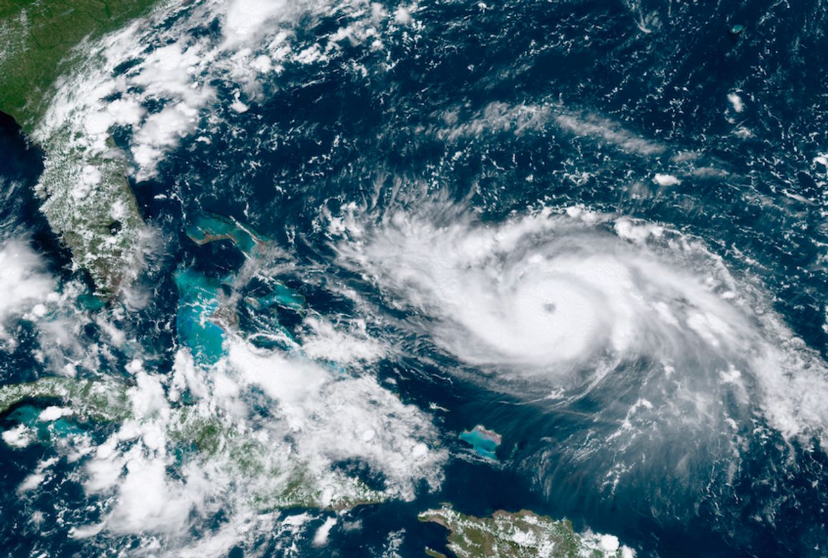 This GOES-16 satellite image taken Friday, Aug. 30, 2019, at 17:20 UTC and provided by National Oceanic and Atmospheric Administration (NOAA), shows Hurricane Dorian, right, moving over open waters in the Atlantic Ocean. Forecasters are now saying Dorian could be a Category 4 with winds of nearly 140 mph (225 kph) when it is forecasted to hit Florida late Monday or early Tuesday. It’s also imperiling the Bahamas, where the storm is expected to hit by Sunday. (NOAA via AP) (AP)