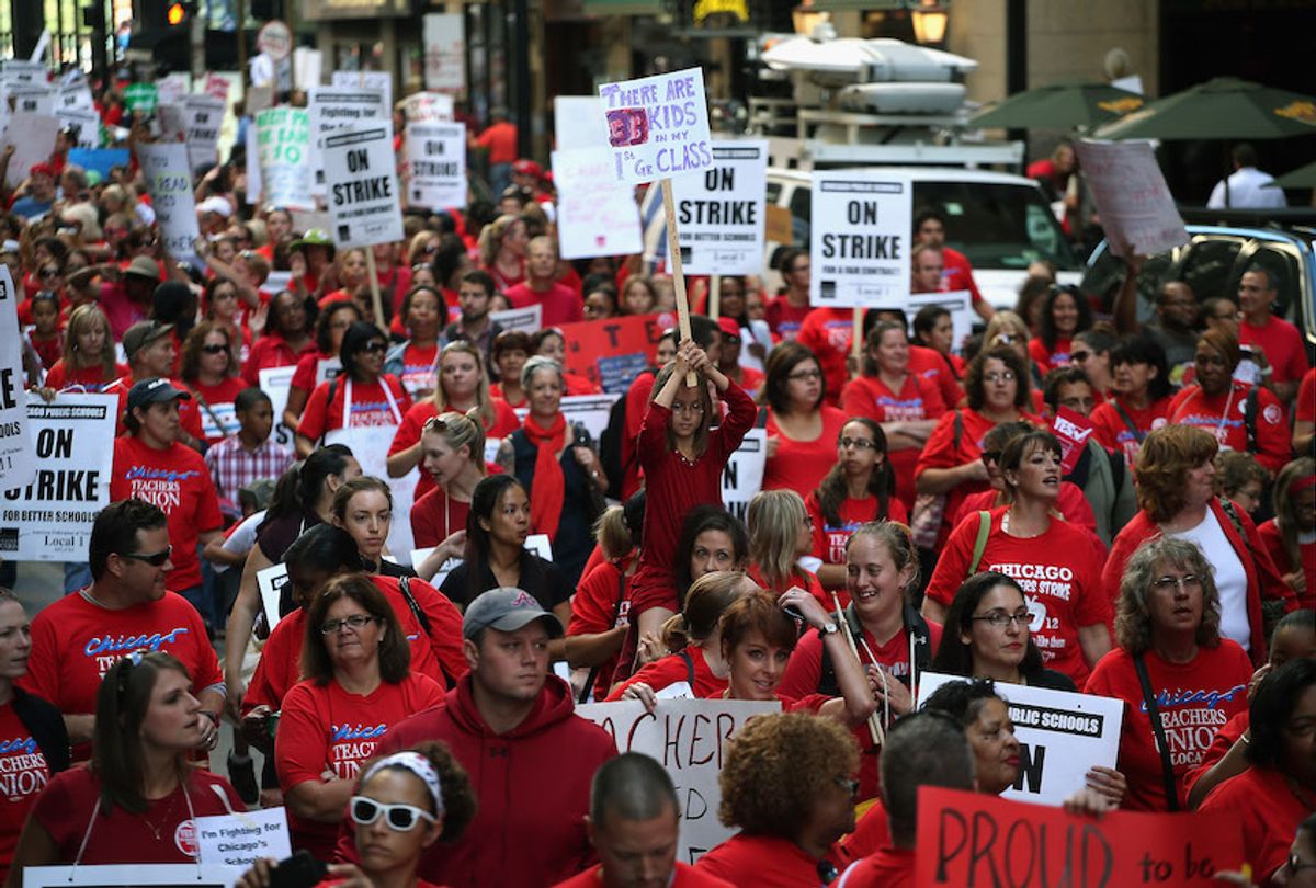Thousands of Chicago public school teachers and their supporters march through the Loop and in front of the Chicago Public Schools (CPS) headquarters on September 10, 2012 in Chicago, Illinois. More than 26,000 teachers and support staff hit the picket lines this morning after the Chicago Teachers Union failed to reach an agreement with the city on compensation, benefits and job security. With about 350,000 students, the Chicago school district is the third largest in the United States. (Photo by Scott Olson/Getty Images) (Photo by Scott Olson/Getty Images)