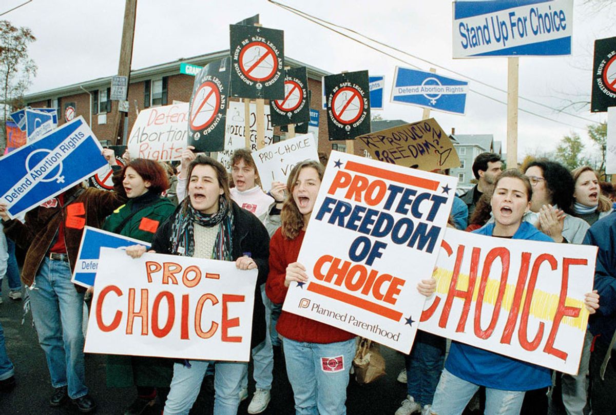 Pro-choice demonstrators rally outside the Women's Medical Clinic in Cranston, R.I., Nov. 4, 1991. (AP/Matthew Brown)
