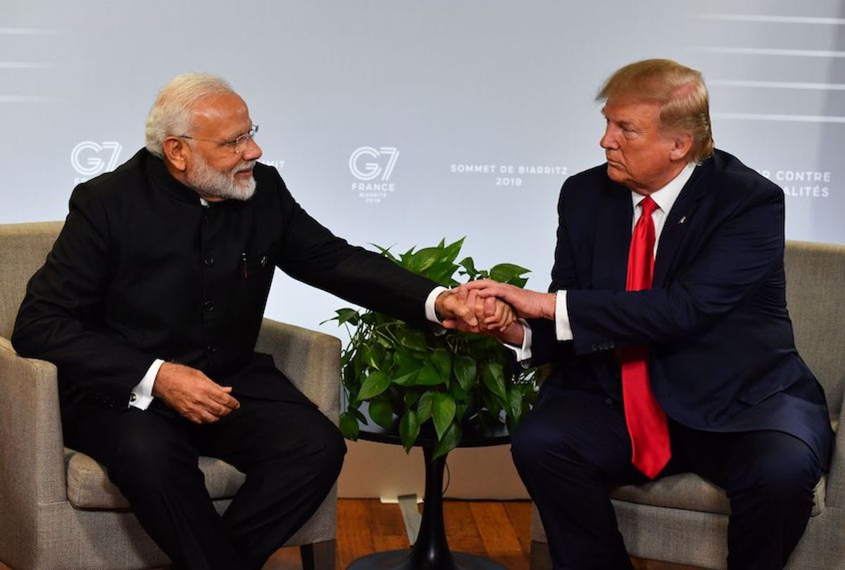Indian Prime Minister Narendra Modi (L) and US President Donald Trump shakes hands as they speak during a bilateral meeting in Biarritz, south-west France on August 26, 2019, on the third day of the annual G7 Summit. (Nicholas Kamm/AFP/Getty Images)