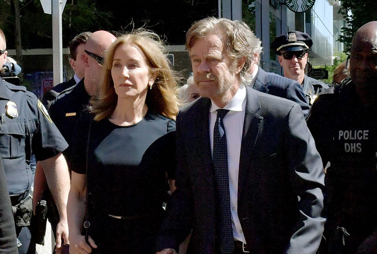 Felicity Huffman and husband William Macy arrive at John Moakley U.S. Courthousefor Huffman's sentencing hearing for her role in the college admissions scandal on September 13, 2019 in Boston, Massachusetts.  (Paul Marotta/Getty Images)