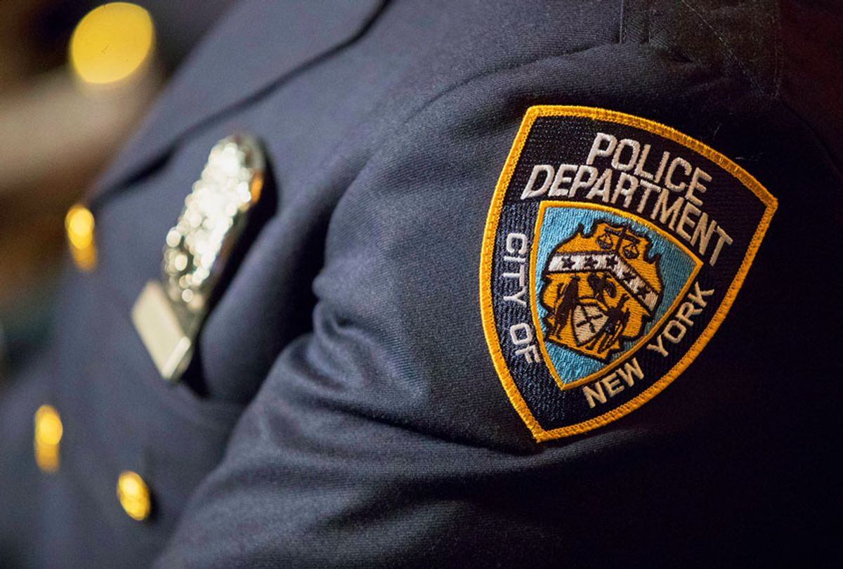 A detail including the badge and shield of one of the newest members of the New York City police. (AP/Mary Altaffer)