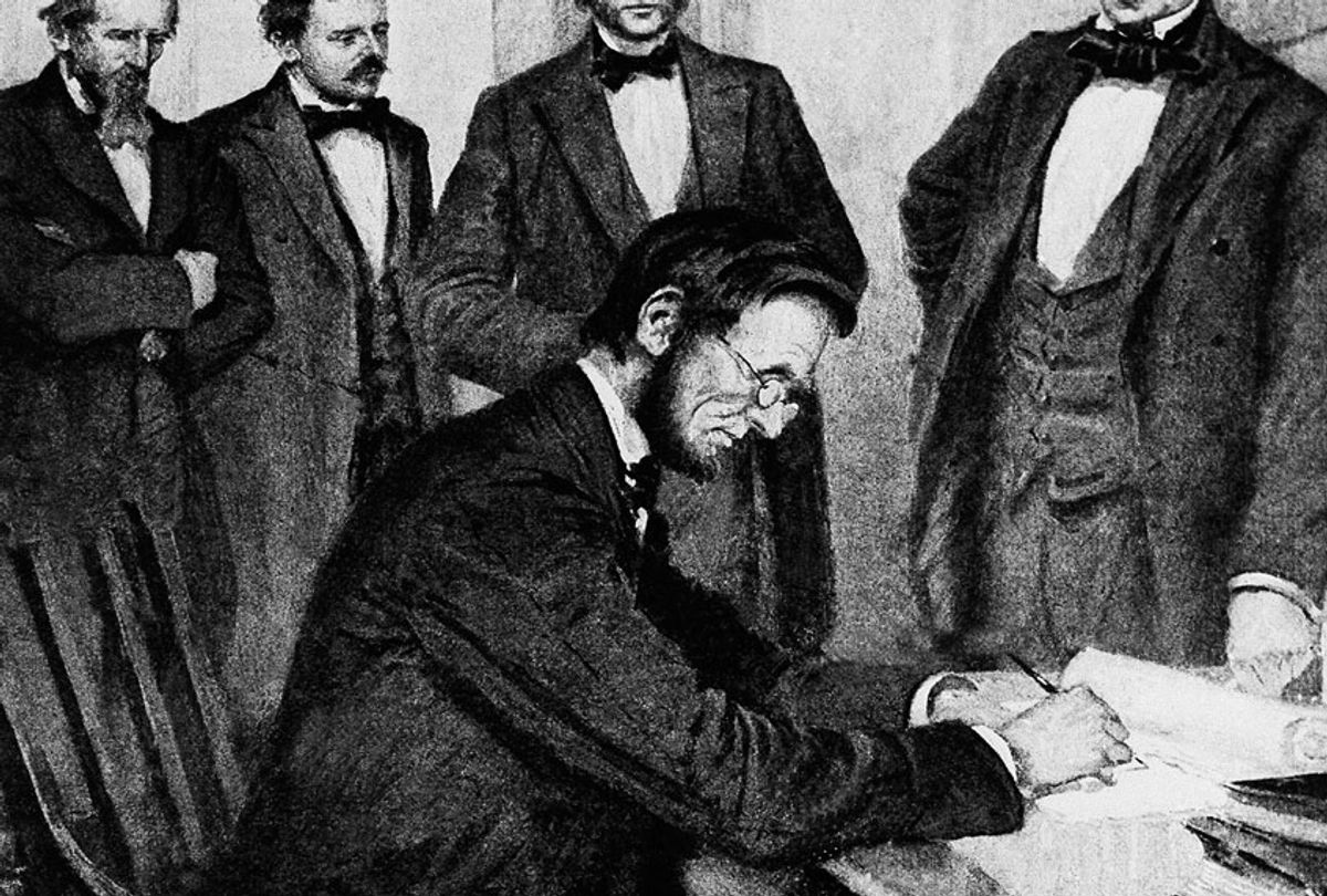 President Abraham Lincoln signs the Emancipation Proclamation, Jan. 1, 1863, in Washington. (AP Photo)