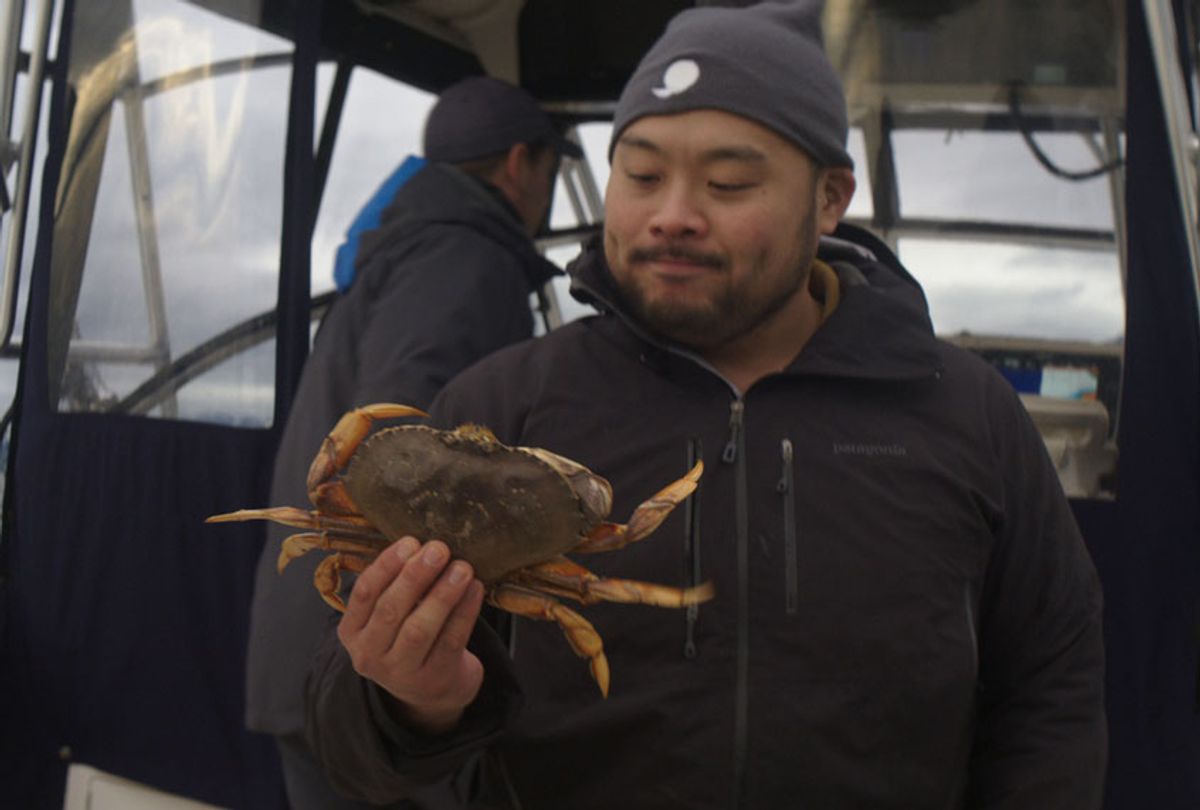 Breakfast, Lunch, & Dinner - Season 1 David Chang evaluating a fresh caught crab while fishing in Vancouver (Netflix)