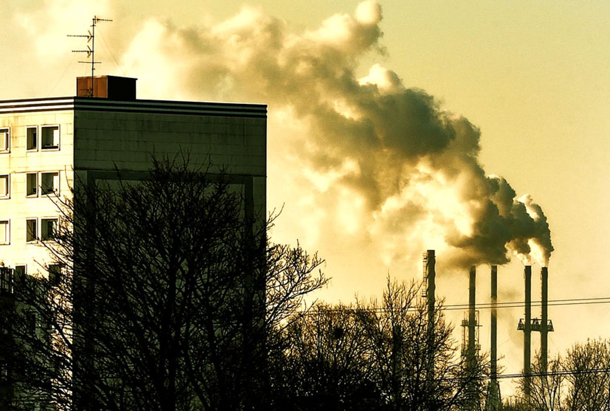 Smoke rises from factory stacks in Santes, near Lille, on January 22, 2013.  (PHILIPPE HUGUEN/AFP/Getty Images)