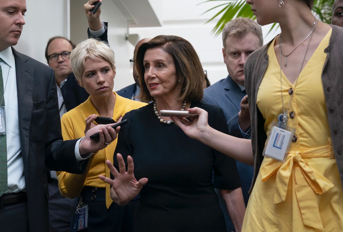 Speaker of the House Nancy Pelosi, D-Calif., is surrounded by reporters as she arrives to meet with her caucus the morning after declaring she will launch a formal impeachment inquiry against President Donald Trump, at the Capitol in Washington, Wednesday, Sept. 25, 2019. (AP Photo/J. Scott Applewhite) (AP Photo/J. Scott Applewhite)