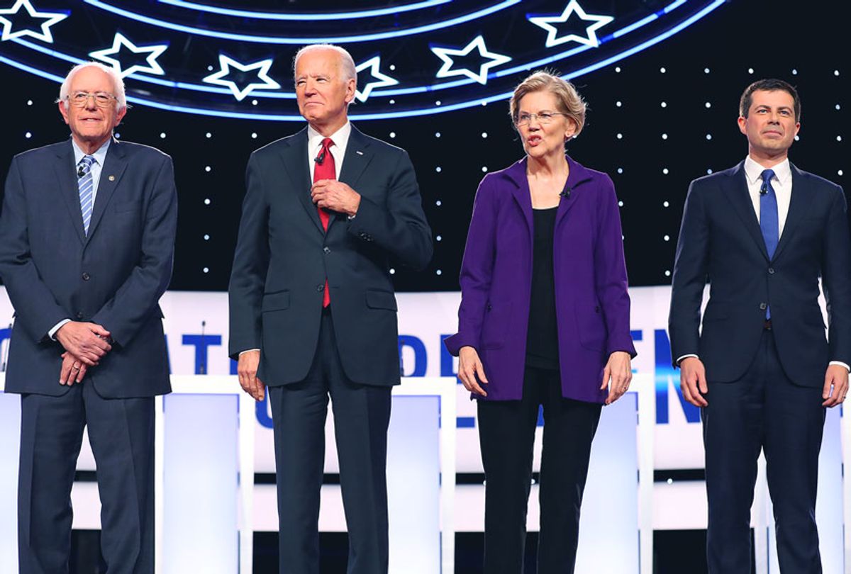 Democratic presidential candidates (L-R) Sen. Bernie Sanders (I-VT), former Vice President Joe Biden, Sen. Elizabeth Warren (D-MA) and South Bend, Indiana Mayor Pete Buttigieg at the start of the Democratic Presidential Debate at Otterbein University on October 15, 2019 in Westerville, Ohio. A record 12 presidential hopefuls are participating in the debate hosted by CNN and The New York Times. (Chip Somodevilla/Getty Images)