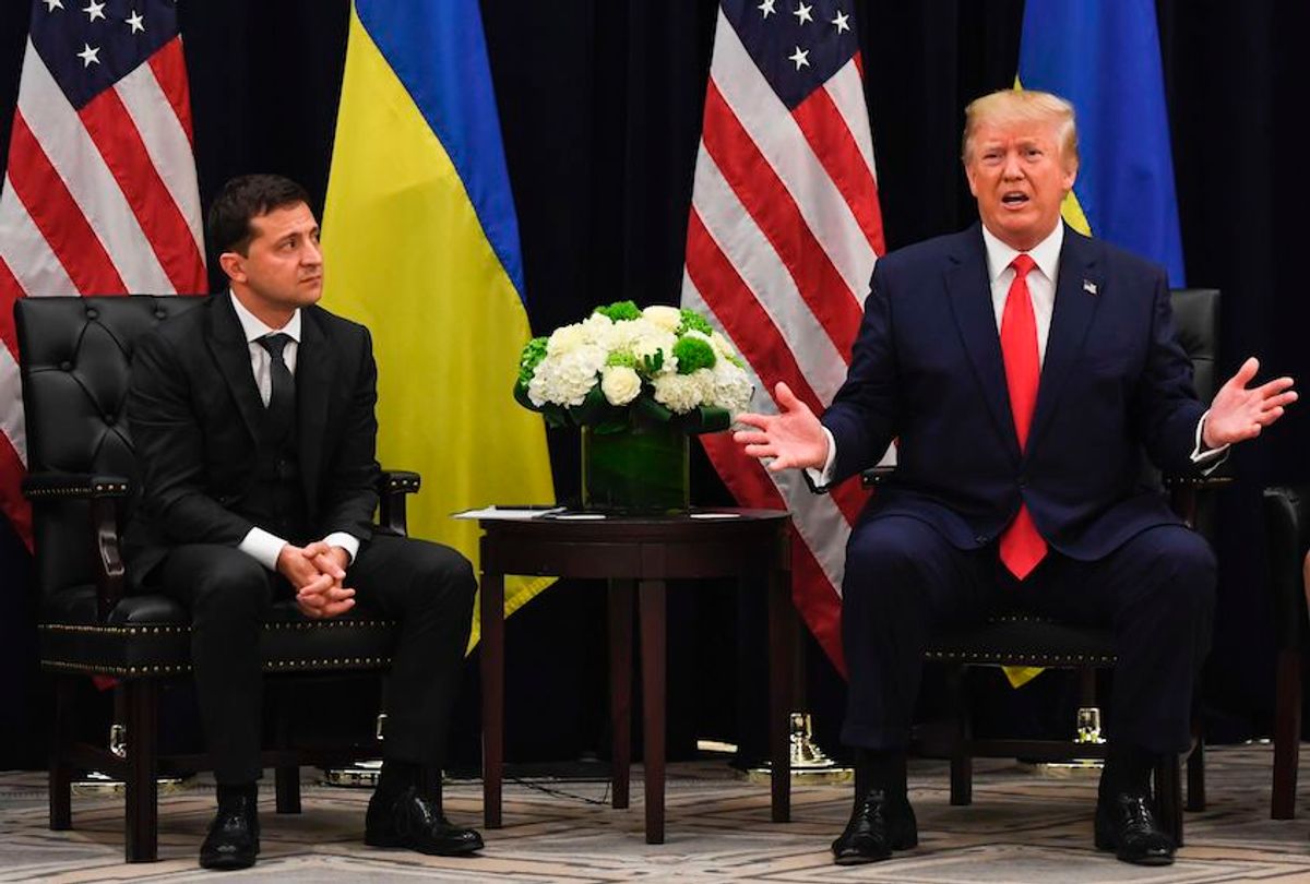 US President Donald Trump speaks as Ukrainian President Volodymyr Zelensky looks on during a meeting in New York on September 25, 2019, on the sidelines of the United Nations General Assembly. (Photo by SAUL LOEB / AFP)        (Photo credit should read SAUL LOEB/AFP/Getty Images) (Saul Loeb/AFP/Getty Images)