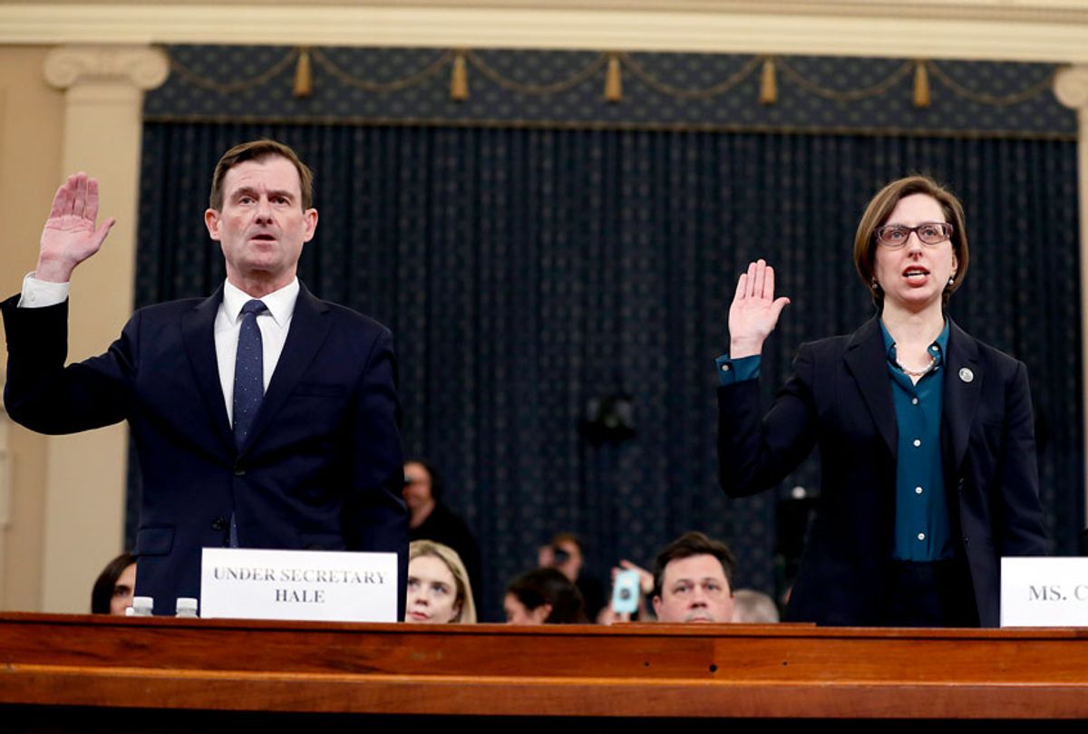 Deputy Assistant Secretary of Defense Laura Cooper, right, and State Department official David Hale, are sworn in to testify before the House Intelligence Committee on Capitol Hill in Washington, Wednesday, Nov. 20, 2019, during a public impeachment hearing of President Donald Trump's efforts to tie U.S. aid for Ukraine to investigations of his political opponents. (AP Photo/Andrew Harnik)