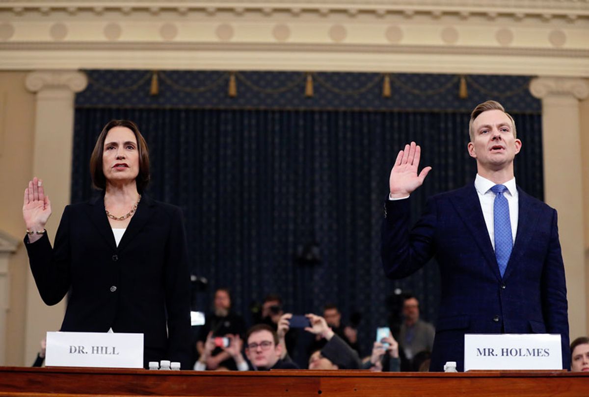 Former White House national security aide Fiona Hill, left, and David Holmes, a U.S. diplomat in Ukraine, are sworn in to testify before the House Intelligence Committee on Capitol Hill in Washington, Thursday, Nov. 21, 2019, during a public impeachment hearing of President Donald Trump's efforts to tie U.S. aid for Ukraine to investigations of his political opponents.  (AP Photo/Andrew Harnik)