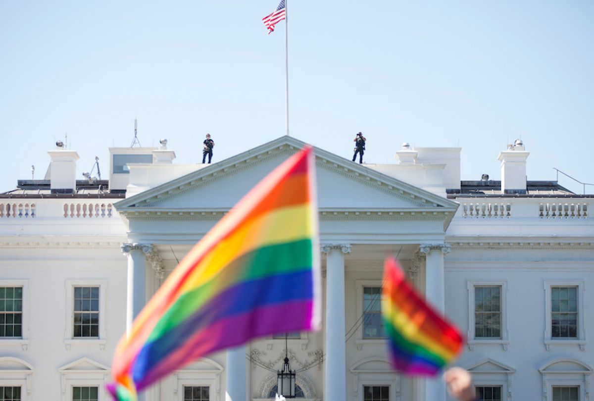 WASHINGTON, DC - JUNE 11:  Demonstrators carry rainbow flags past The White House during the Equality March for Unity and Peace on June 11, 2017 in Washington, D.C. (Photo by Zach Gibson/Getty Images) (Zach Gibson/Getty Images)