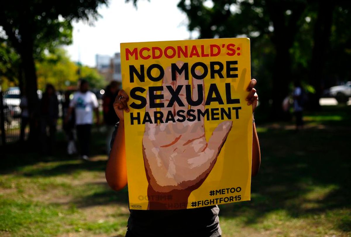 A McDonald's employee holds a sign during a protest against sexual harassment in the workplace on September 18, 2018 in Chicago, Illinois. - McDonald's workers in 10 US cities staged a one-day strike Tuesday inspired by the #MeToo movement, alleging the fast-food giant does not adequately address pervasive sexual harassment at its stores. (Photo by Joshua Lott / AFP)        (Photo credit should read JOSHUA LOTT/AFP via Getty Images) (Joshua Lotti/AFP via Getty Images)